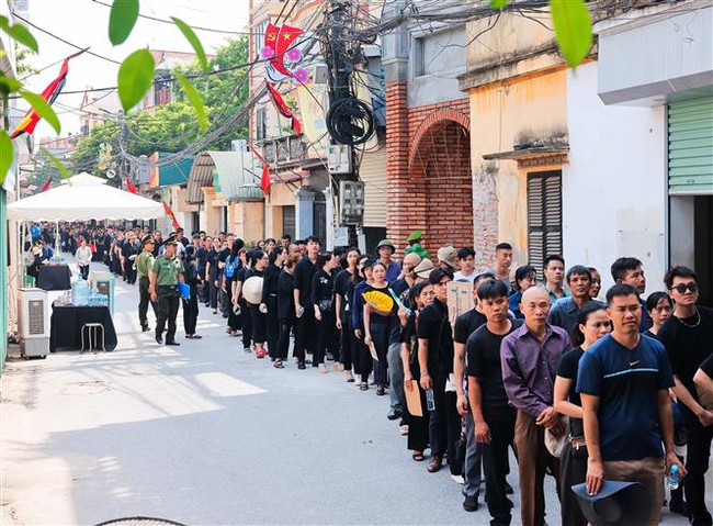 Lễ viếng Tổng Bí thư Nguyễn Phú Trọng sáng ngày 26/7 - Ảnh 2. Lễ viếng Tổng Bí thư Nguyễn Phú Trọng sáng ngày 26/7 - Ảnh 2.